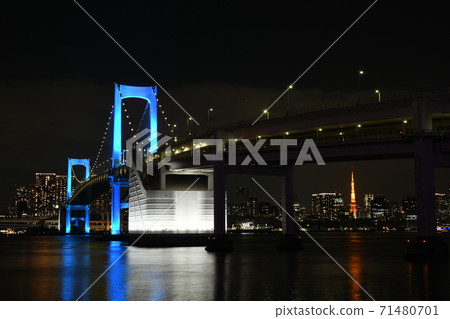 The night view of Tokyo Rainbow Bridge illuminated in blue and Tokyo Tower under the bridge The night view of Tokyo Rainbow Bridge illuminated in blue and Tokyo Tower under the bridge 71480701