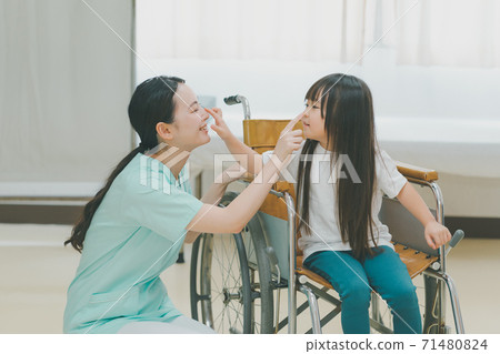5-year-old child in a wheelchair 5-year-old child in a wheelchair 71480824