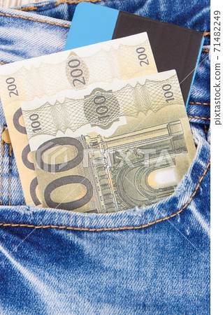 Currencies euro and credit card in jeans pocket. Cashless or cash paying for shopping 71482249