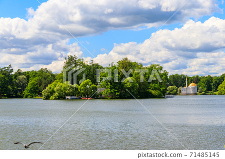 Big pond with Turkish Bath pavilion on a coast in the Catherine Park in Tsarskoye Selo, Pushkin, Russia Big pond with Turkish Bath pavilion on a coast in the Catherine Park in Tsarskoye Selo, Pushkin, Russia 71485145
