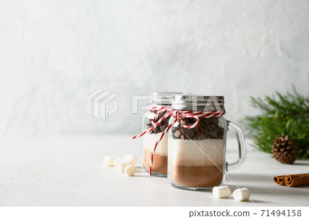 Homemade edible Christmas gift in glass jar Homemade edible Christmas gift in glass jar 71494158