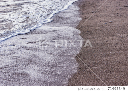 Wave of the sea water at evening time. Wave of the sea water at evening time. 71495849