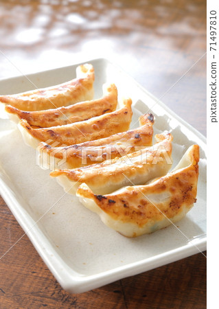 Grilled dumplings vertical composition Grilled dumplings vertical composition 71497810