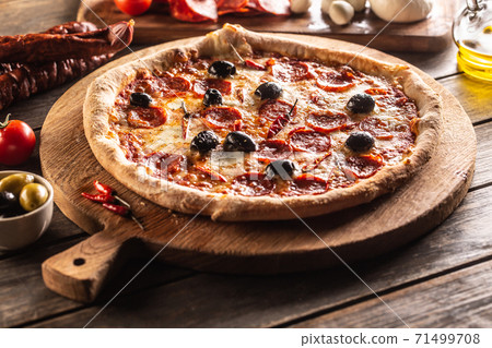 Pizza diavola traditional italian meal with spicy 71499708