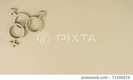 Two male and one female symbols made of cardboard. Polygamous marriage concept 71500819