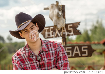 Cowboy on sign background. 71507379