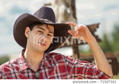 Cowboy on sign background. Cowboy on sign background. 71507381