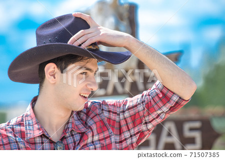 Cowboy on sign background. Cowboy on sign background. 71507385