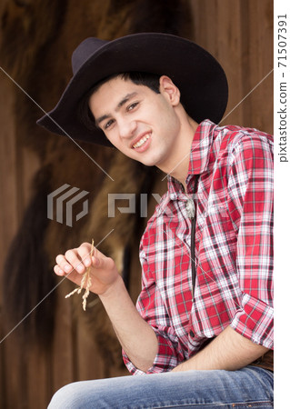 Cowboy having rest 71507391