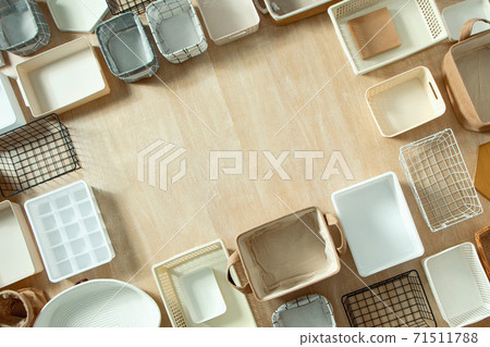 Top view of closet organization boxes and steel wire baskets in different shapes. 71511788