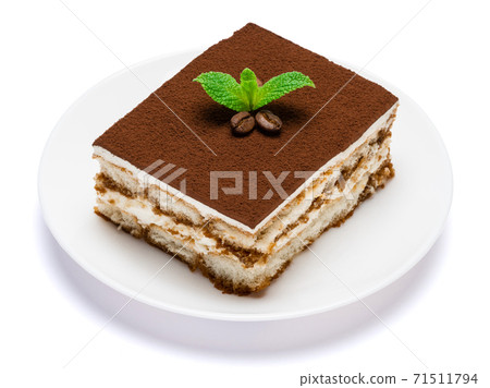 Traditional Italian Tiramisu square dessert portion on ceramic plate isolated on white background with clipping path 71511794