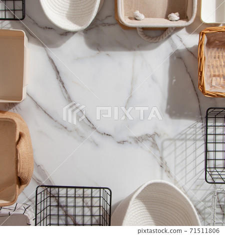 Top view of closet organization boxes and steel wire baskets in different shapes. Top view of closet organization boxes and steel wire baskets in different shapes. 71511806