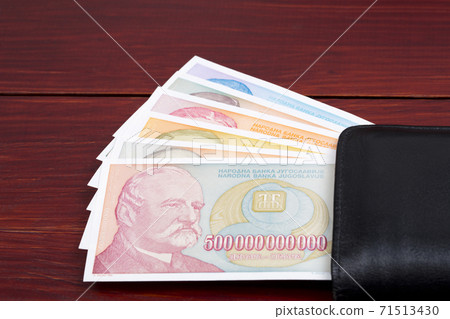 Old Yugoslavian money in the black wallet 71513430