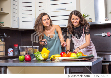 Twins on kitchen in the morning Twins on kitchen in the morning 71513696
