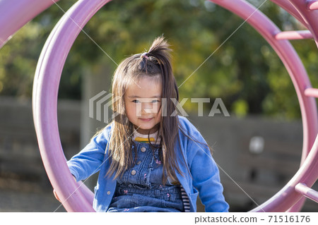 A smiling 4-year-old girl, a smiling 5-year-old girl A smiling 4-year-old girl, a smiling 5-year-old girl 71516176
