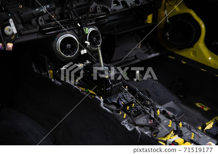 Car factory. Car without interior elements. Car under montage. 71519177