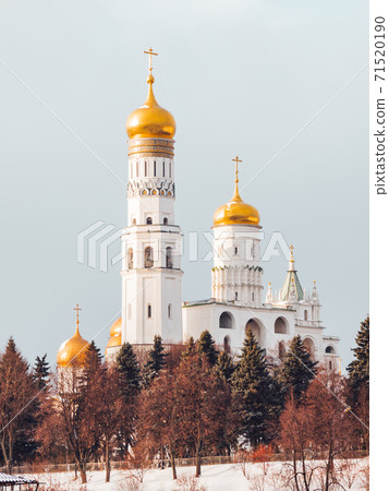 Ivan the Great Bell Tower, church tower inside the Moscow Kremlin complex. Winter day in Moscow, Russia. Ivan the Great Bell Tower, church tower inside the Moscow Kremlin complex. Winter day in Moscow, Russia. 71520190