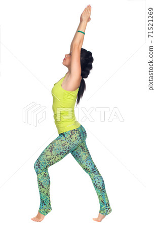 Cheerful young exercising woman, isolated over white background 71521269