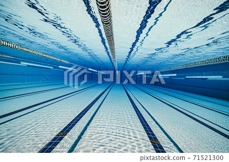Olympic Swimming pool under water background. 71521300