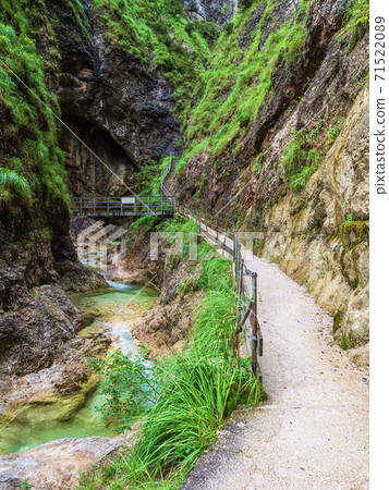 Walk in the gorge Almbachklamm in the Berchtesgaden Alps, Germany 71522089