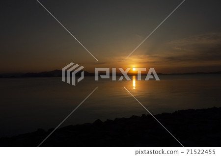 Lake sunset and yellow sun 71522455