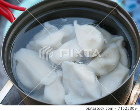 Dumplings made outdoors 71523809