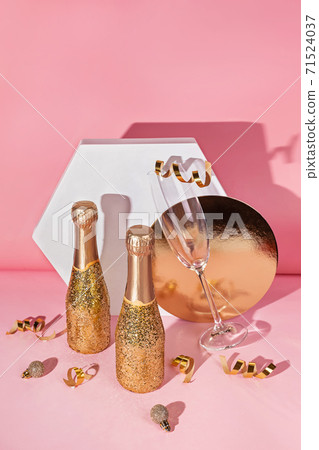 Creative still life composition with mini bottles of champagne 71524037