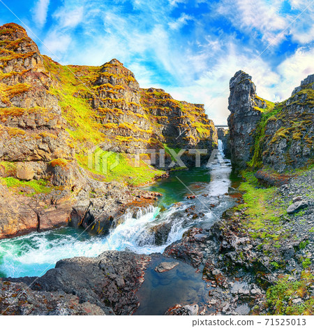 Astonishing view of  Kolugljufur canyon and Kolufossar falls. Astonishing view of  Kolugljufur canyon and Kolufossar falls. 71525013