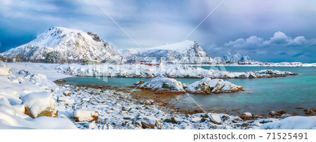 Fabulous snowy winter scene of Valberg village with snowy mountain peaks on Lofoten Islands Fabulous snowy winter scene of Valberg village with snowy mountain peaks on Lofoten Islands 71525491