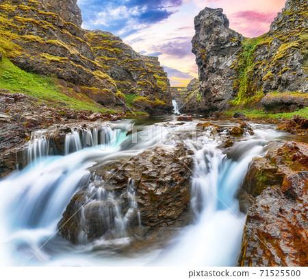 Spectacular view of  Kolugljufur canyon and Kolufossar falls. Spectacular view of  Kolugljufur canyon and Kolufossar falls. 71525500