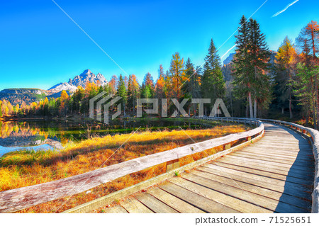 Astonishing view of popular travel destination mountain lake Antorno in autumn 71525651