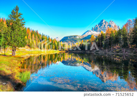 Astonishing view of popular travel destination mountain lake Antorno in autumn 71525652