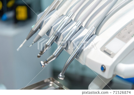 Dentist tools and equipment at dental office 71526874