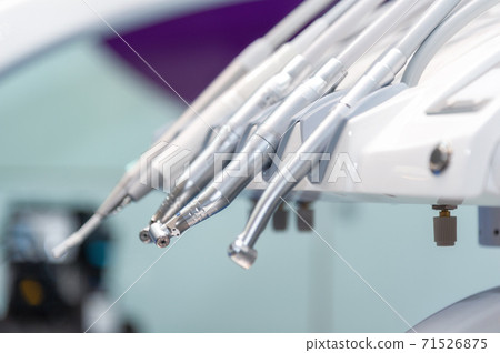 Dentist tools and equipment at dental office 71526875