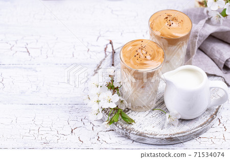 Dalgona whipped coffee with milk 71534074