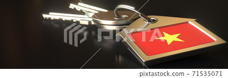 Keys and house keychain with flag of Vietnam. National property rental or real estate market concepts. 3d rendering Keys and house keychain with flag of Vietnam. National property rental or real estate market concepts. 3d rendering 71535071