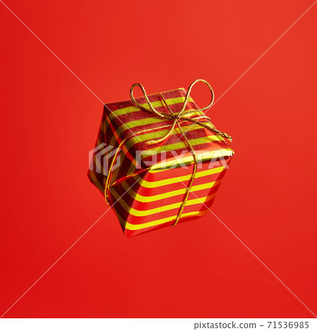 New year gift for greeting card on the red background New year gift for greeting card on the red background 71536985