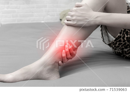 Close up of woman shin or leg injury. healthcare and medical concept 71539063