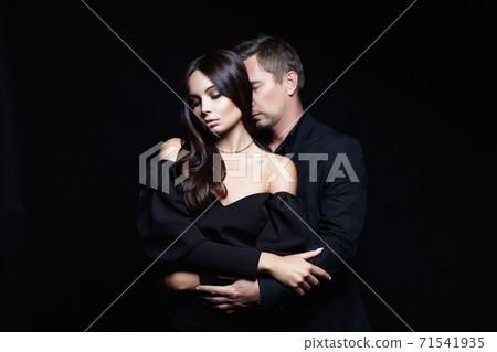 elegant girl seducing her handsome boyfriend elegant girl seducing her handsome boyfriend 71541935