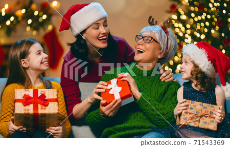 family celebrating Christmas family celebrating Christmas 71543369