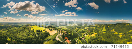 Aerial view at Kitzeck im Sausal in Styria on sunny summer day. Aerial view at Kitzeck im Sausal in Styria on sunny summer day. 71549453