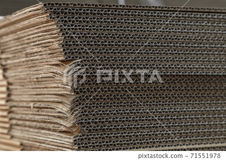 Close-up of cardboard folded in several layers 71551978