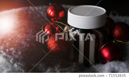 Sweet chocolate cream in the jar against Christmas background 71552635