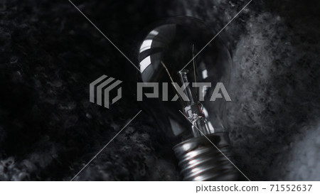 Light Bulb On a gray knitted background 71552637