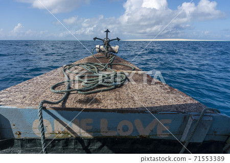 Bow side of Traditional Zanzibar Dhow boat with anchor and Rope 71553389