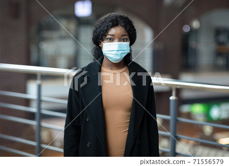 Shopaholic during covid-19 quarantine, seasonal Black Friday sales and social distancing Shopaholic during covid-19 quarantine, seasonal Black Friday sales and social distancing 71556579