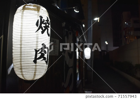 Back alley at night, lanterns in a tavern 71557943