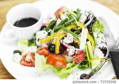 traditional greek salad with feta cheese and mixed organic vegetables traditional greek salad with feta cheese and mixed organic vegetables 71558306