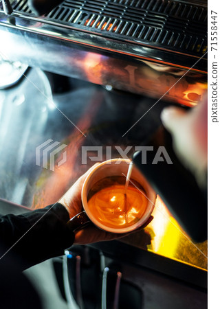 making espresso coffee close up detail with modern machine making espresso coffee close up detail with modern machine 71558447