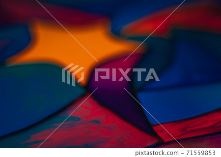 Part of a beautiful colorful stained glass background with a star image including yellow, red, blue, violet and pink pieces. Part of a beautiful colorful stained glass background with a star image including yellow, red, blue, violet and pink pieces. 71559853